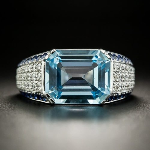 Blue Topaz, Diamond, and Sapphire Ring.