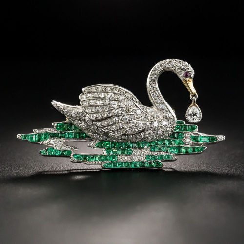 Early Art Deco Diamond and Emerald Swan Brooch. Early Art Deco Diamond and Emerald Swan Brooch.