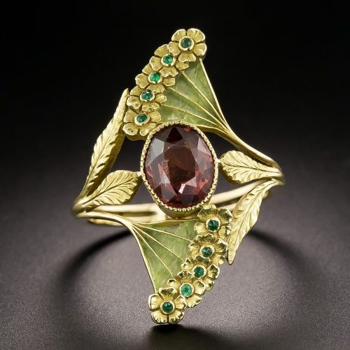 French Art Nouveau Plique-à-Jour Garnet and Emerald Dinner Ring. French Art Nouveau Plique-à-Jour Garnet and Emerald Dinner Ring.