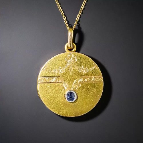 Late Victorian Locket with Applied Platinum Bezel with Sapphire. Late Victorian Locket with Applied Platinum Bezel with Sapphire.