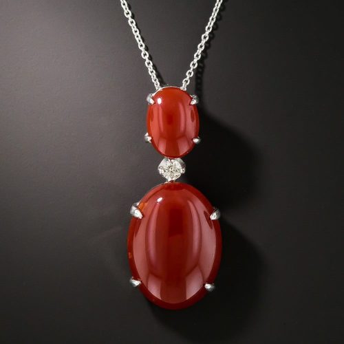 Opaque Red Coral and Diamond Pendant.