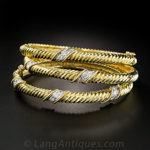 Collection of Three Diamond and Yellow Gold Bangle Bracelets.